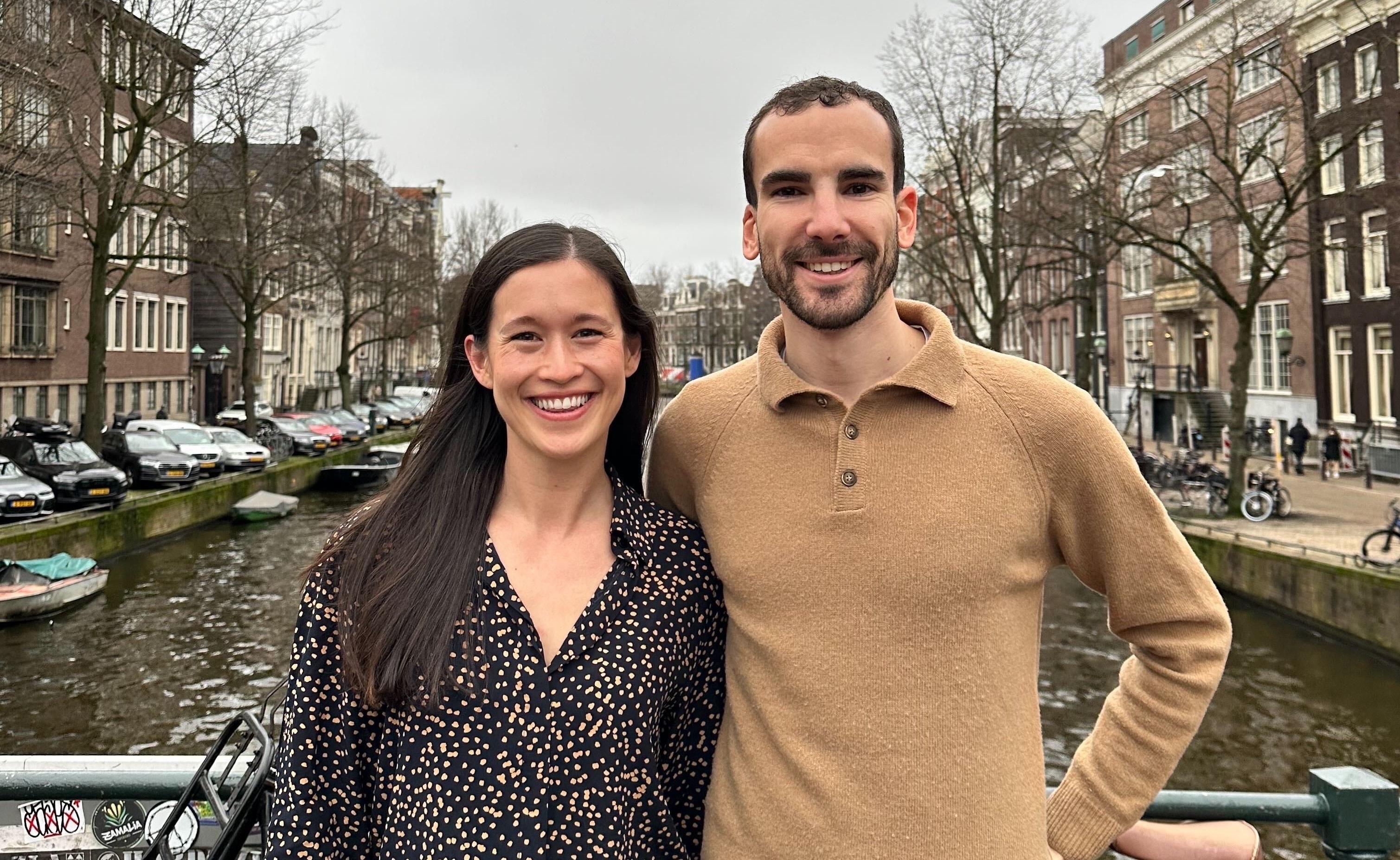 A photograph of Sara and Samy on a bridge in Amsterdam.